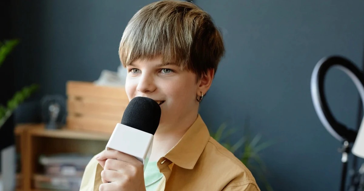 Picture of teenager giving a speech about peer pressure.
