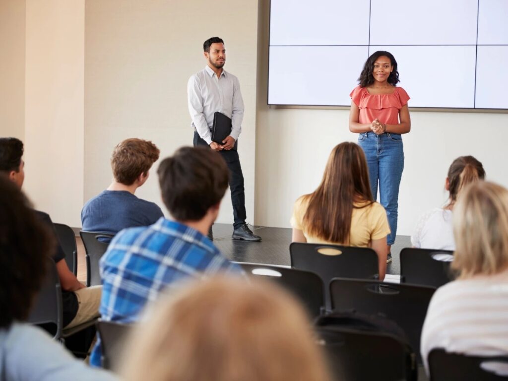 Teen giving a peer pressure speech in school.